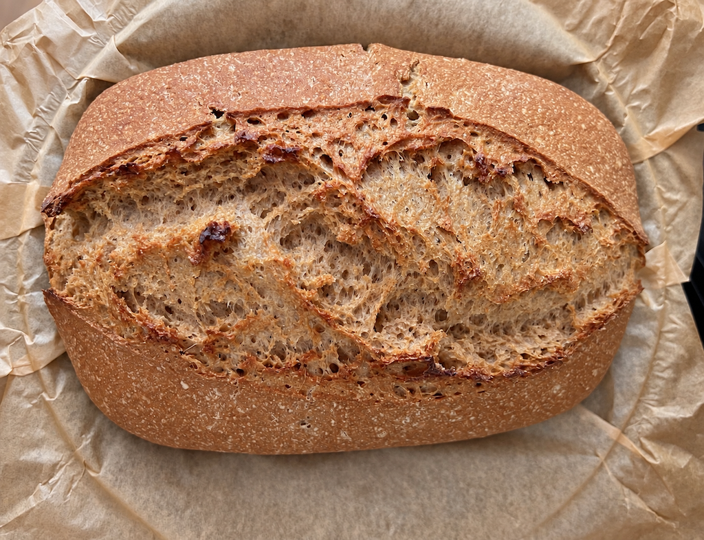crusty artisan bread on parchment paper